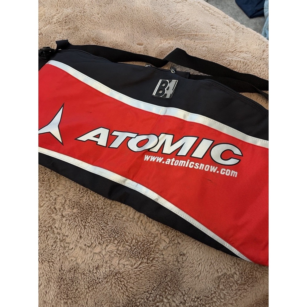 ATOMIC SKI RACING BAG - Bright Red, Black, and White Checkered Flag Design